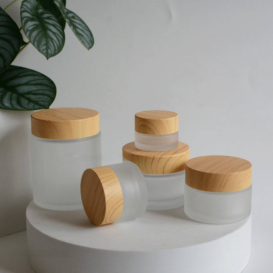 30GM & 50GM ROUND GLASS JAR WITH WOODEN CAP CHINA